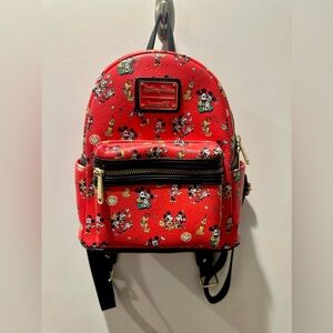 Loungefly Disney Parks Mickey & Minnie Runaway Railway Mini Backpack.